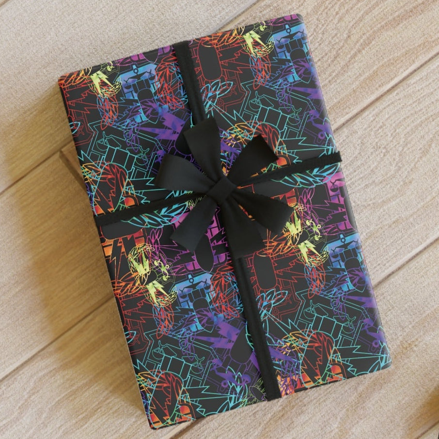 Colorful gift box with black ribbon on a wooden floor