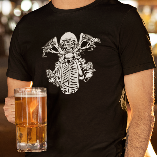 A man wearing a black t-shirt with a white graphic of a skull riding a motorcycle, holding a glass of beer.