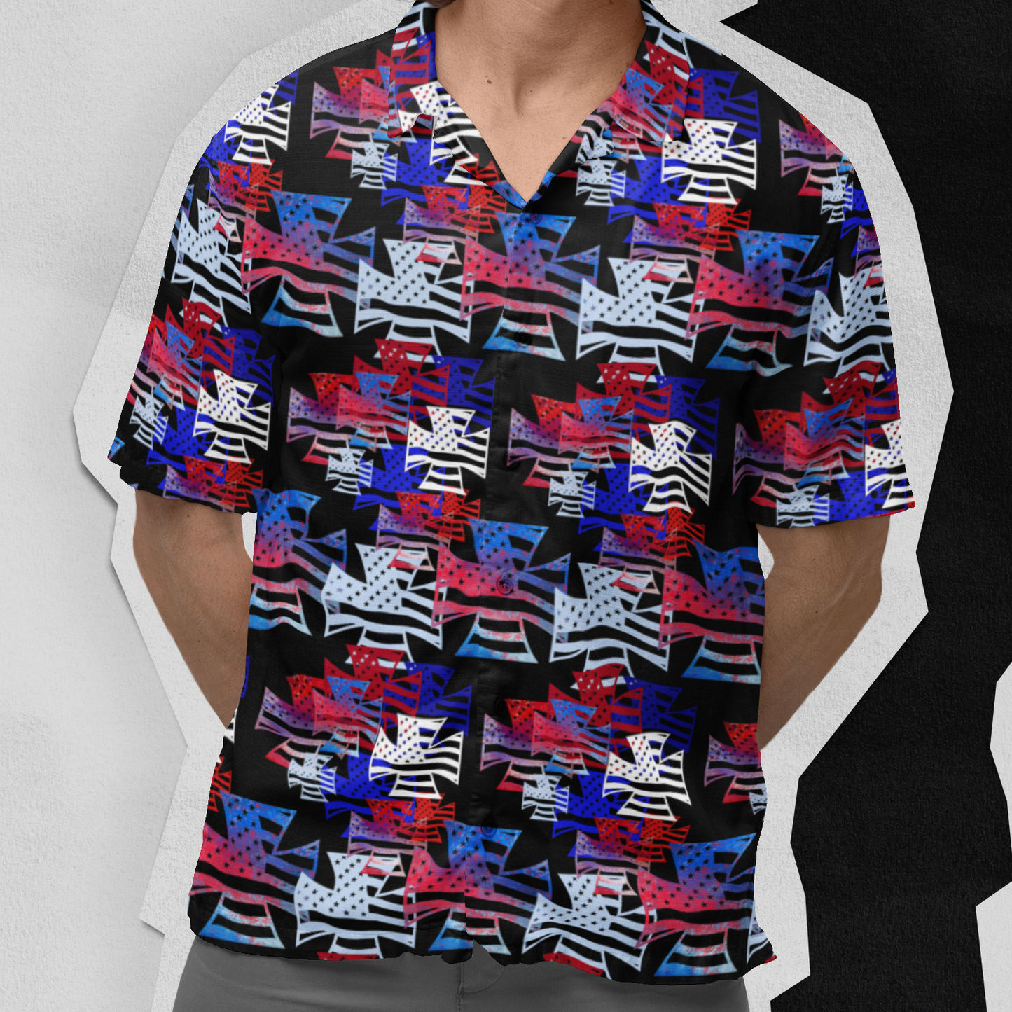 Man wearing a colorful patterned shirt and sunglasses against a white background