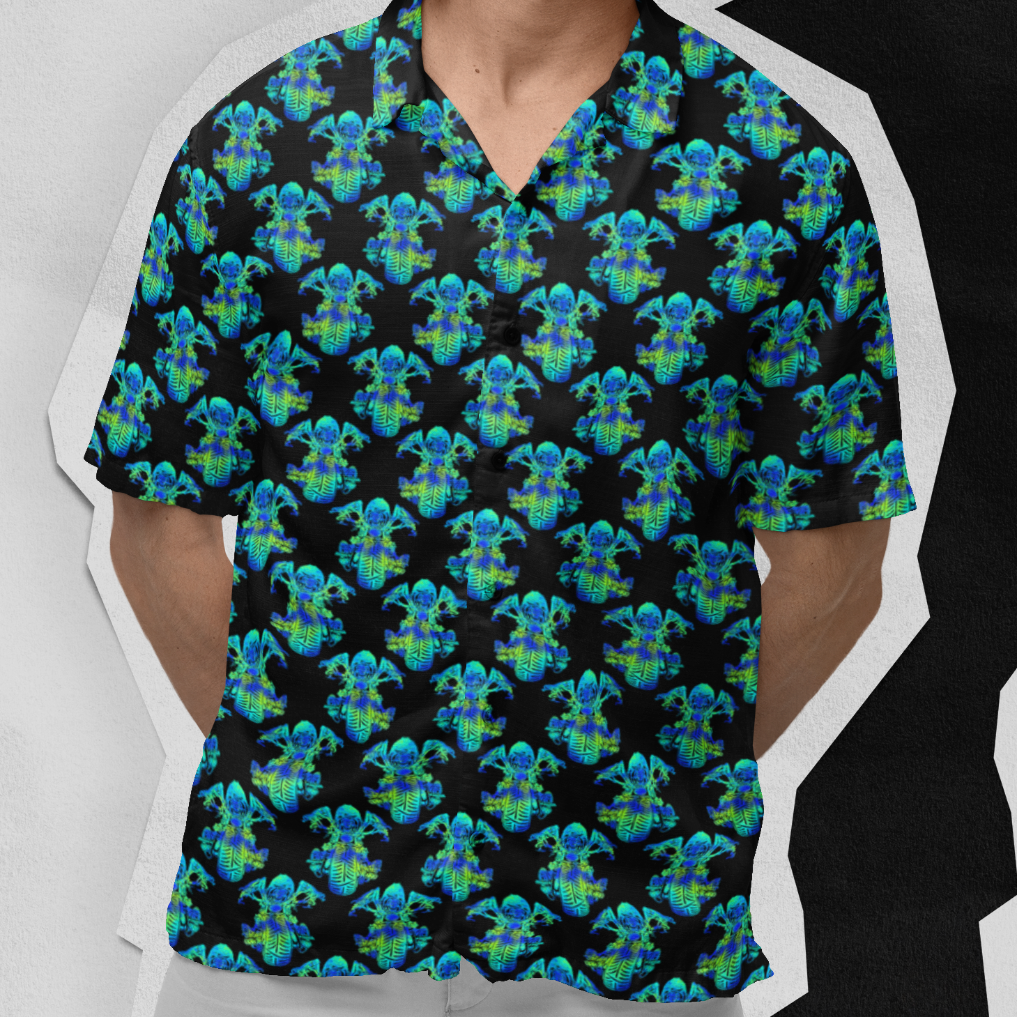 Man wearing a colorful patterned shirt and sunglasses against a white background