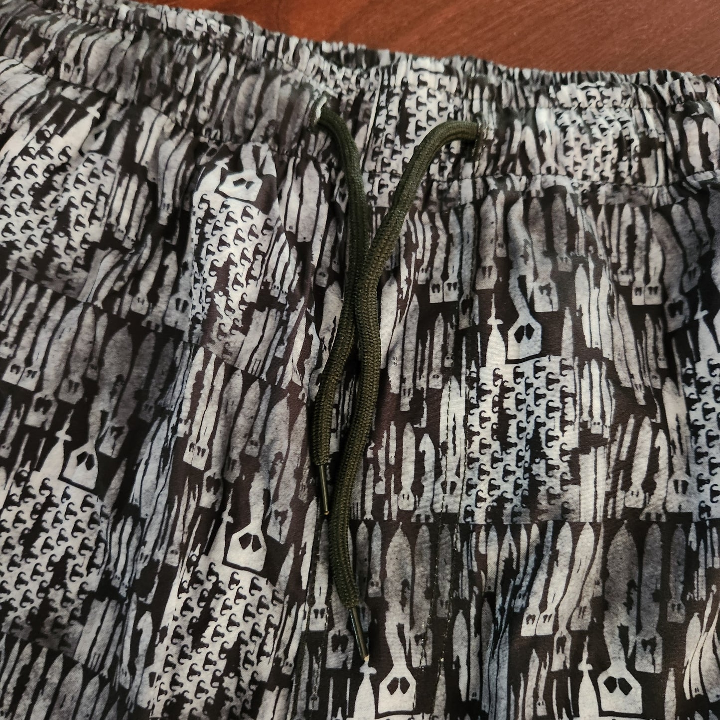 Men's Board Shorts (SAMPLE) - "EOD Bomb Flag" (Grey on Black) Small pattern